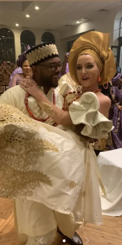 Groom Carrying the Bride on Dance Floor